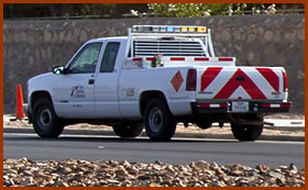 TXDOT Trucks by Traffic Barricade